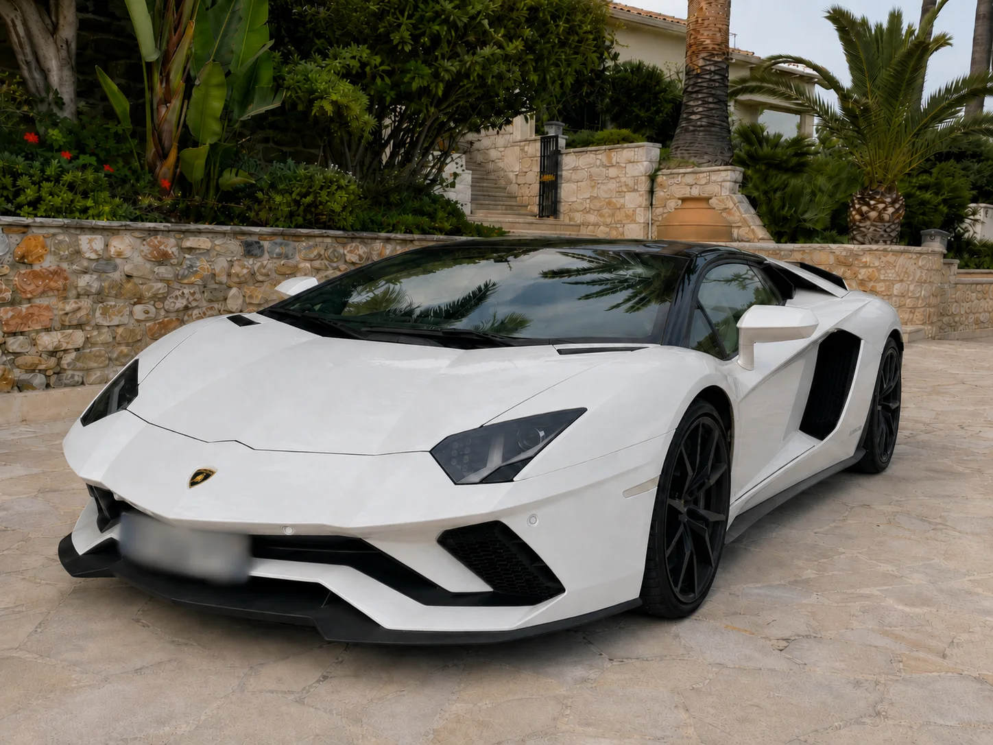 Lamborghini Aventador blanche après nettoyage automobile